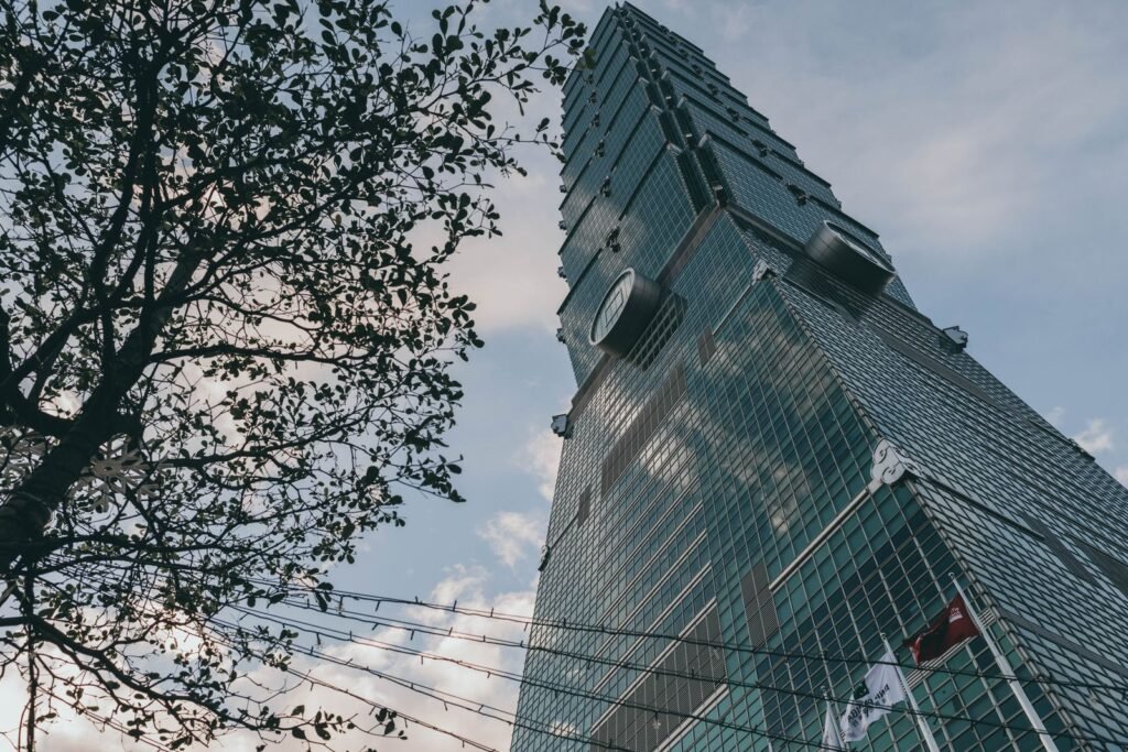 Taipei 101 skyscraper above the Taipei skyline, illustrative stock photo
